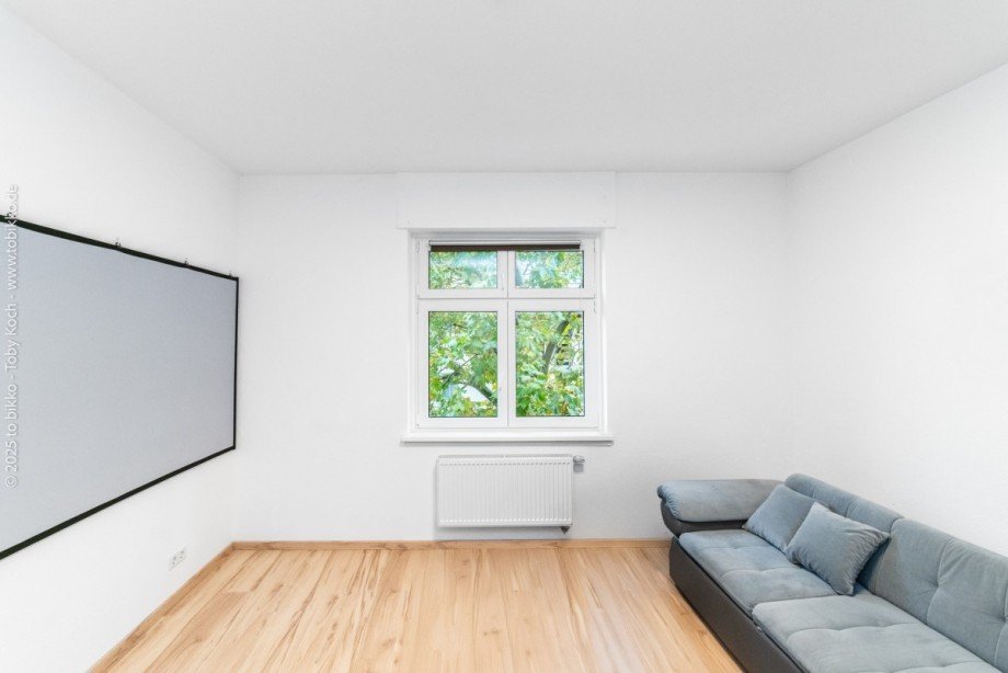 Wohnzimmer 3. OG Mehrfamilienhaus Frankfurt am Main