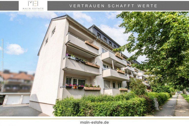 Titelbild Neu-Isenburg Erdgeschosswohnung Charmante 2-Zimmer-Wohnung mit Garage und Balkon in Neu-Isenburg