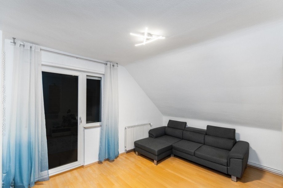 Wohnzimmer DG Mehrfamilienhaus Langen (Hessen)