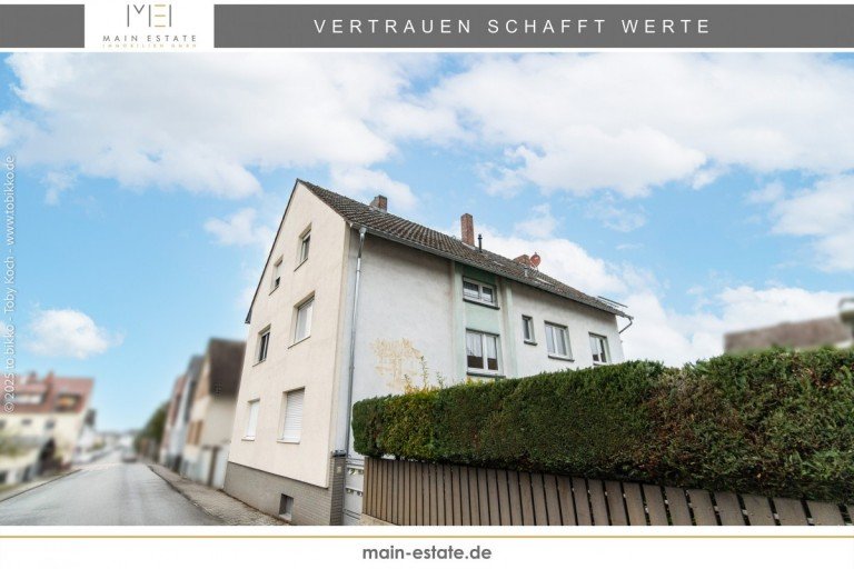 Hausansicht Langen (Hessen) Mehrfamilienhaus Vielseitiges Renditeobjekt: Gepflegtes Mehrgenerationenhaus mit drei Wohneinheiten und Nebengeb�ude