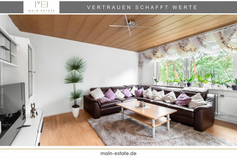 Wohnzimmer Neu-Isenburg Etagenwohnung Vermietete 4-Zimmer-Wohnung als Kapitalanlage mit Loggia und Garage
