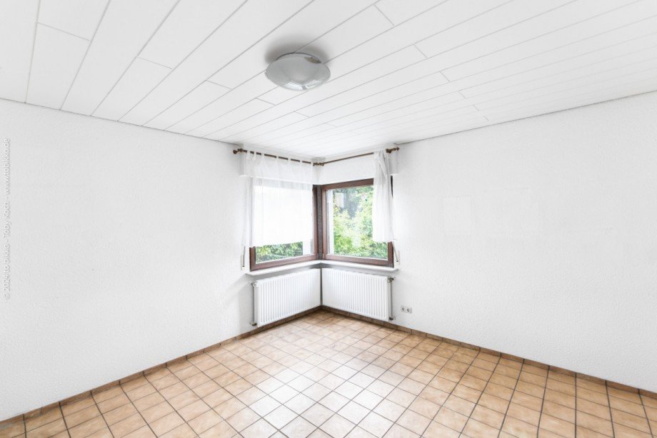 Wohnzimmer EG mit Fenster Einfamilienhaus Neu-Isenburg