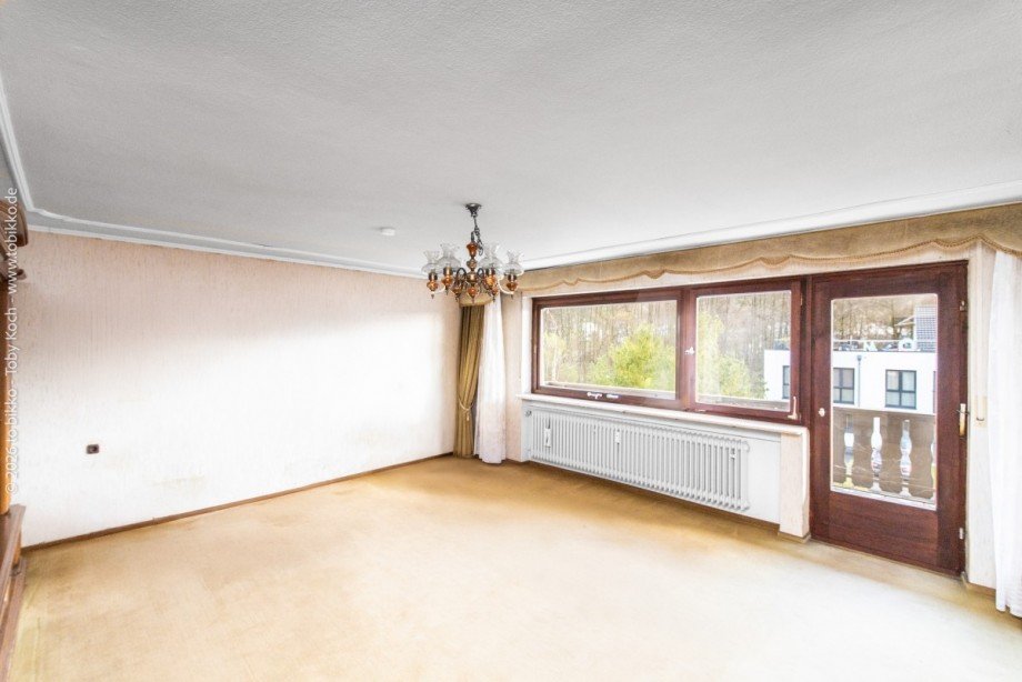 Wohnzimmer 1. OG Mehrfamilienhaus Laufach