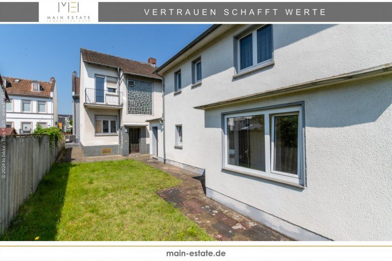 Hausansicht Neu-Isenburg Zweifamilienhaus Attraktives Ein-/Zweifamilienhaus mit gro�z�gigem Nebengeb�ude im Herzen von Neu-Isenburg
