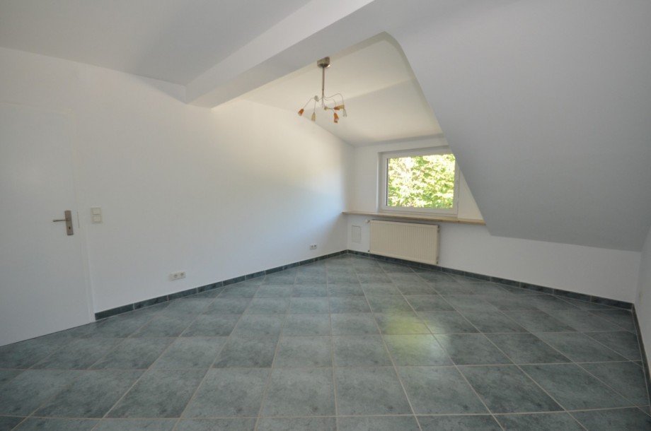 Schlafzimmer (DG) Mehrfamilienhaus Neu-Isenburg