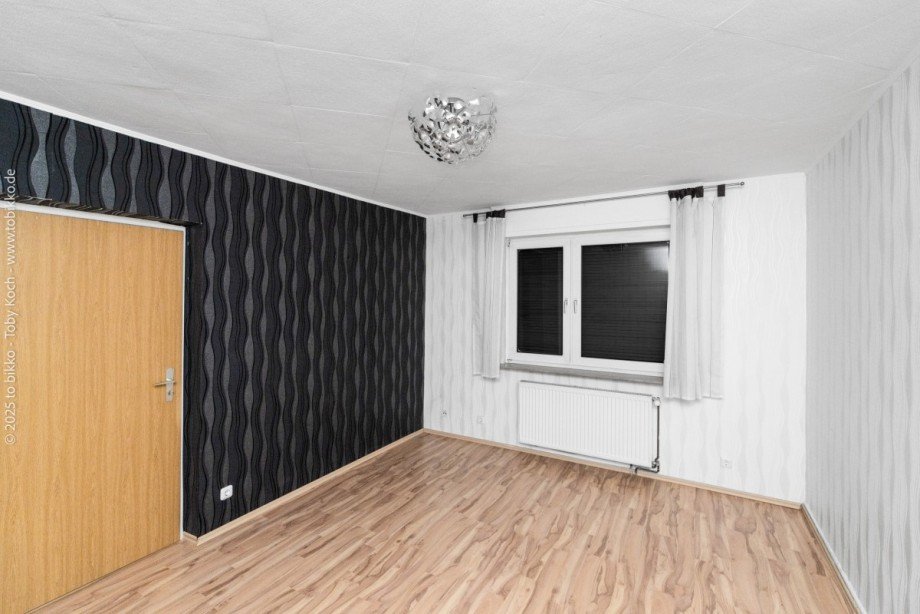 Wohnzimmer EG Mehrfamilienhaus Langen (Hessen)