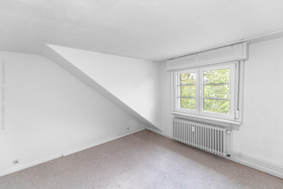 Wohnzimmer Wohnung DG Mehrfamilienhaus Neu-Isenburg