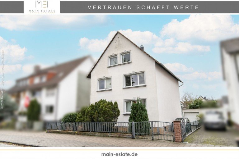Titelbild Neu-Isenburg Mehrfamilienhaus Neu-Isenburg: Gepflegtes Mehrfamilienhaus mit drei Wohneinheiten und Garten