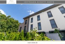 Frontansicht Willkommen im Traumhaus der Moderne - Entdecken Sie das stilvolle Reihenmittelhaus im Neubaugebiet