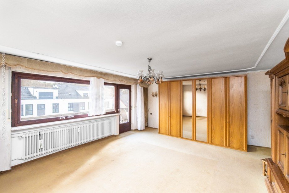 Wohnzimmer 1. OG Mehrfamilienhaus Laufach