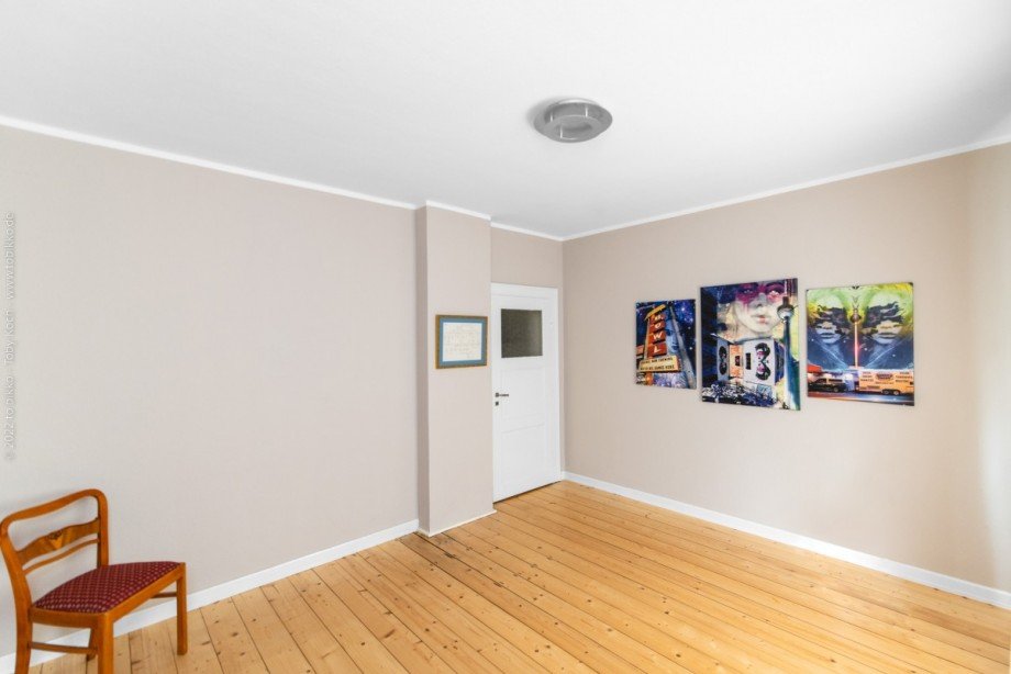 Wohnzimmer Wohnung EG Mehrfamilienhaus Neu-Isenburg