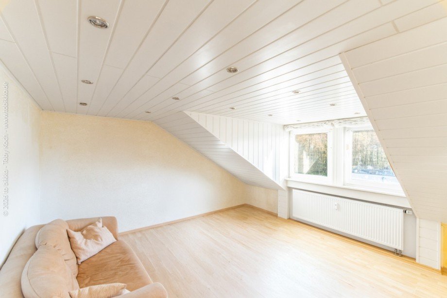 Wohnzimmer DG Mehrfamilienhaus Laufach