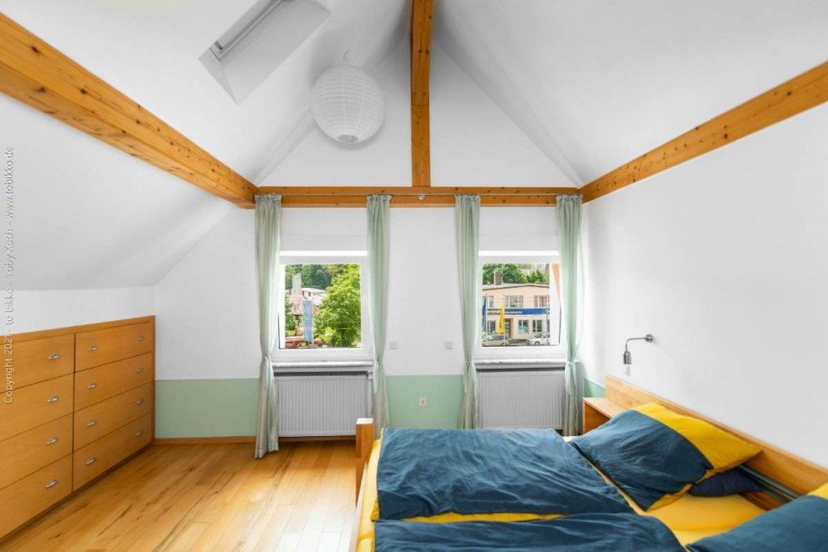 Schlafzimmer DG Mehrfamilienhaus Oberursel (Taunus)